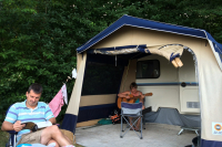 Cosiness around music and book reading at the campground